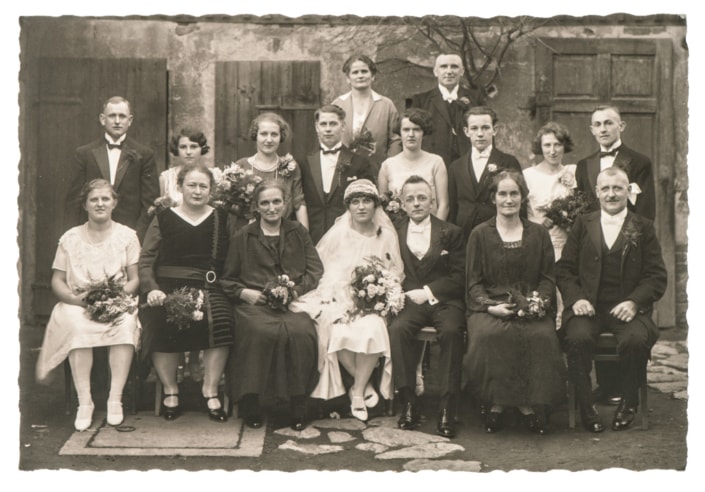Old family wedding photo. Antique fashion dress